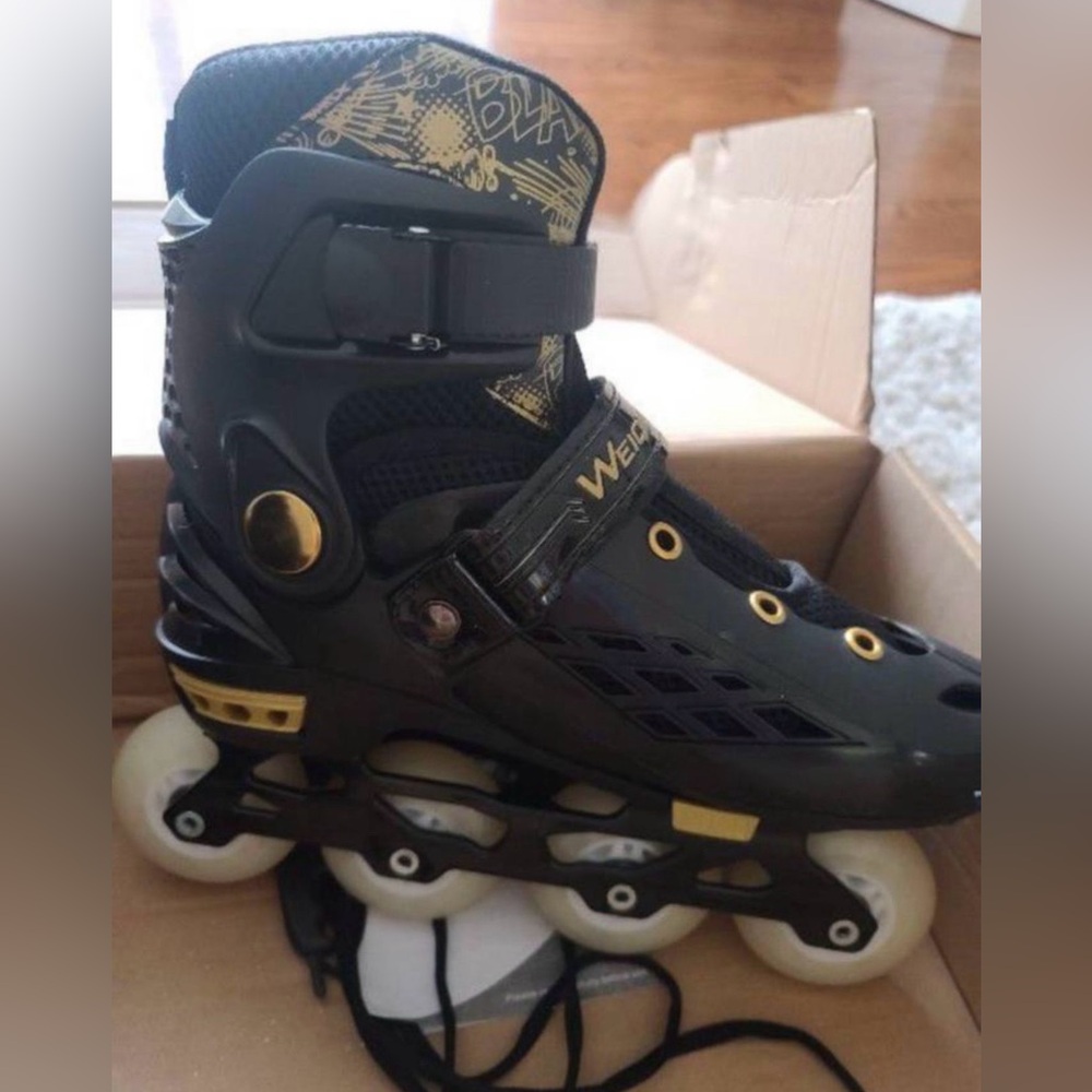 Unisex Black and Gold Rollerblades